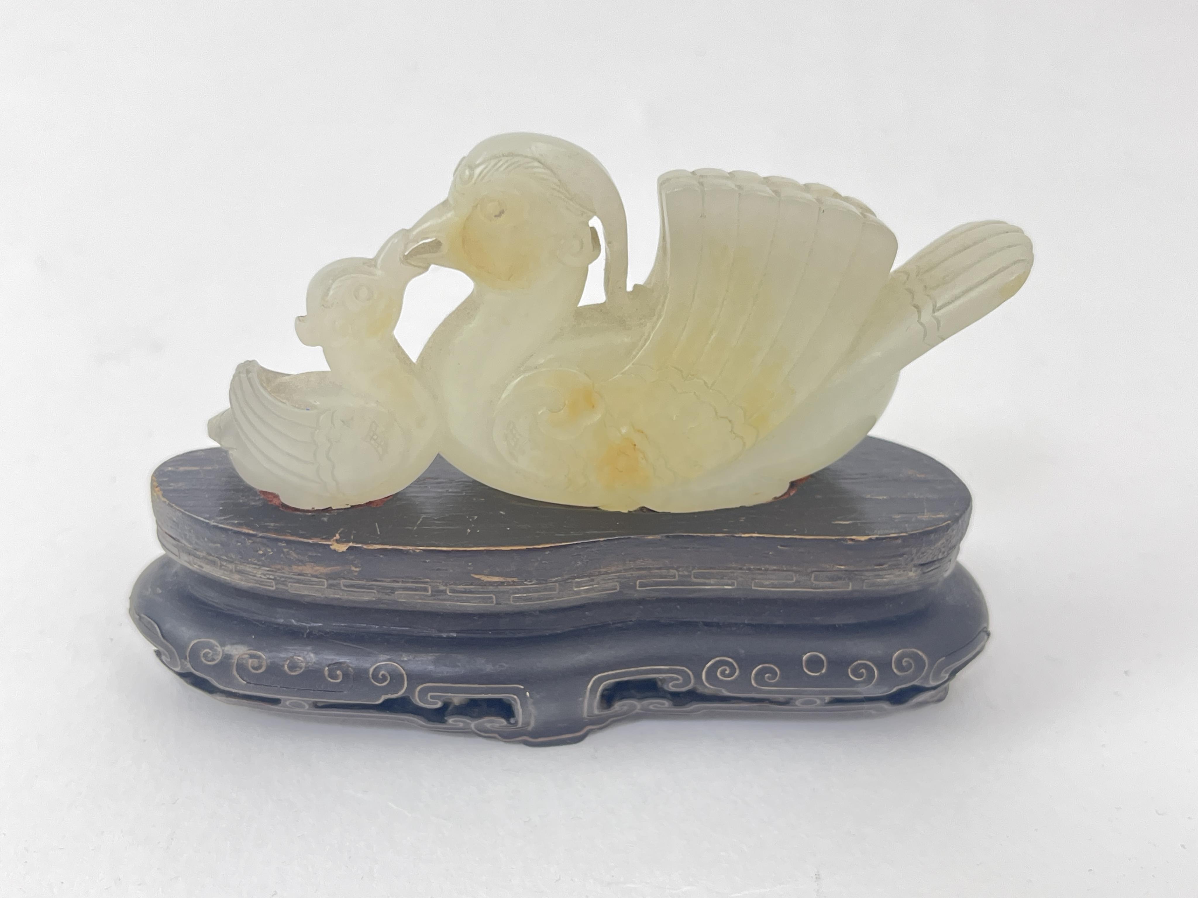 A Chinese white jade mandarin duck group, 18th/19th century